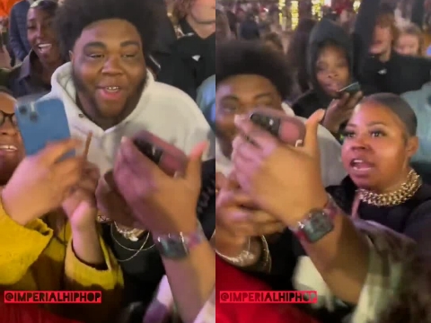 Unaware fans pose for photos with a phony Rod Wave