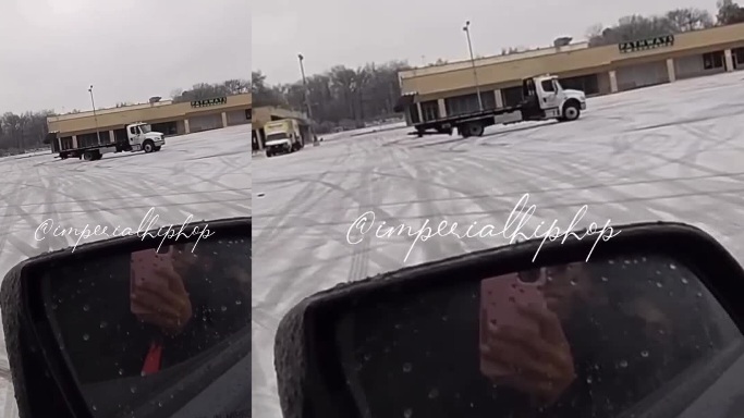 Driver Of A Flatbed Truck Having Too Much Fun In The Snow