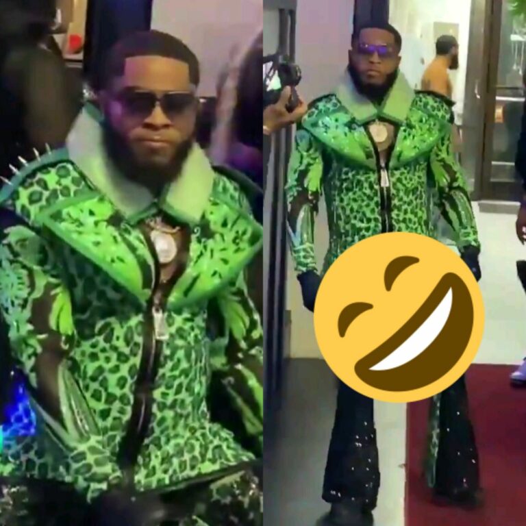 A Male Dancer Enters The Club, Donning An Outfit Reminiscent Of A Character From Dragon Ball Z
