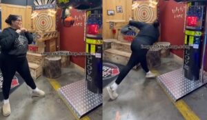 A Woman Strikes A Punching Bag Machine, Resulting In The Following Outcome